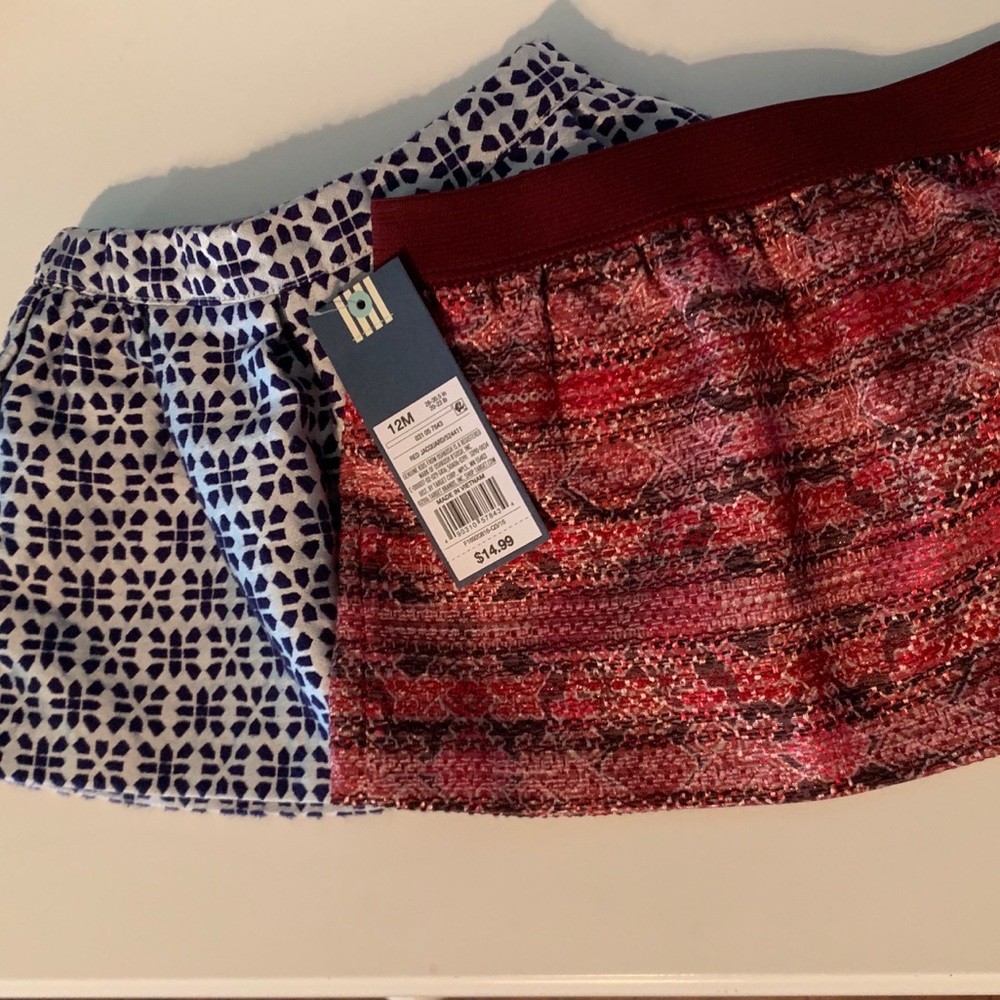 2 NWT girls 12mt toddler skirts.